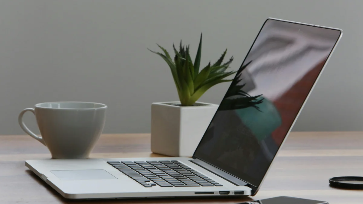 A macbook on a clean table