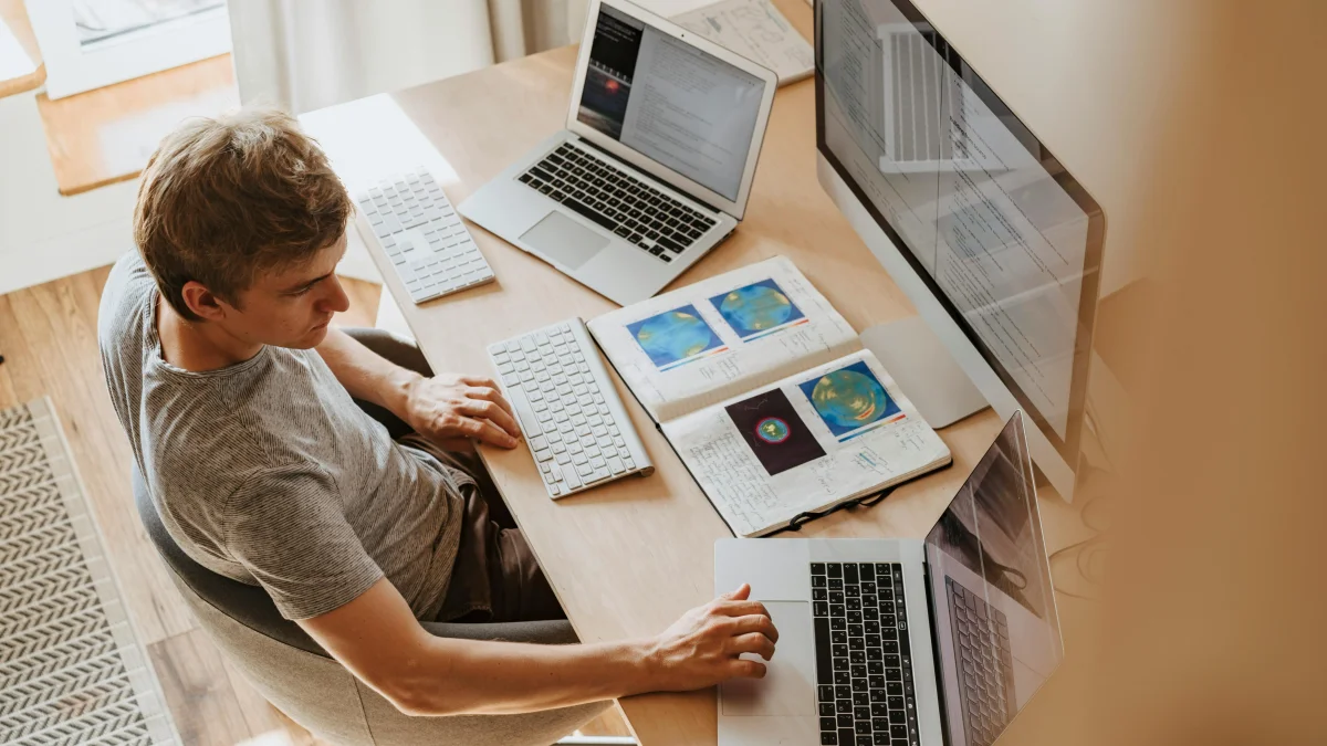 User working with a Macbook